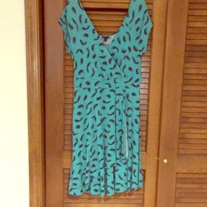 Torrid faux wrap teal with navy feather print